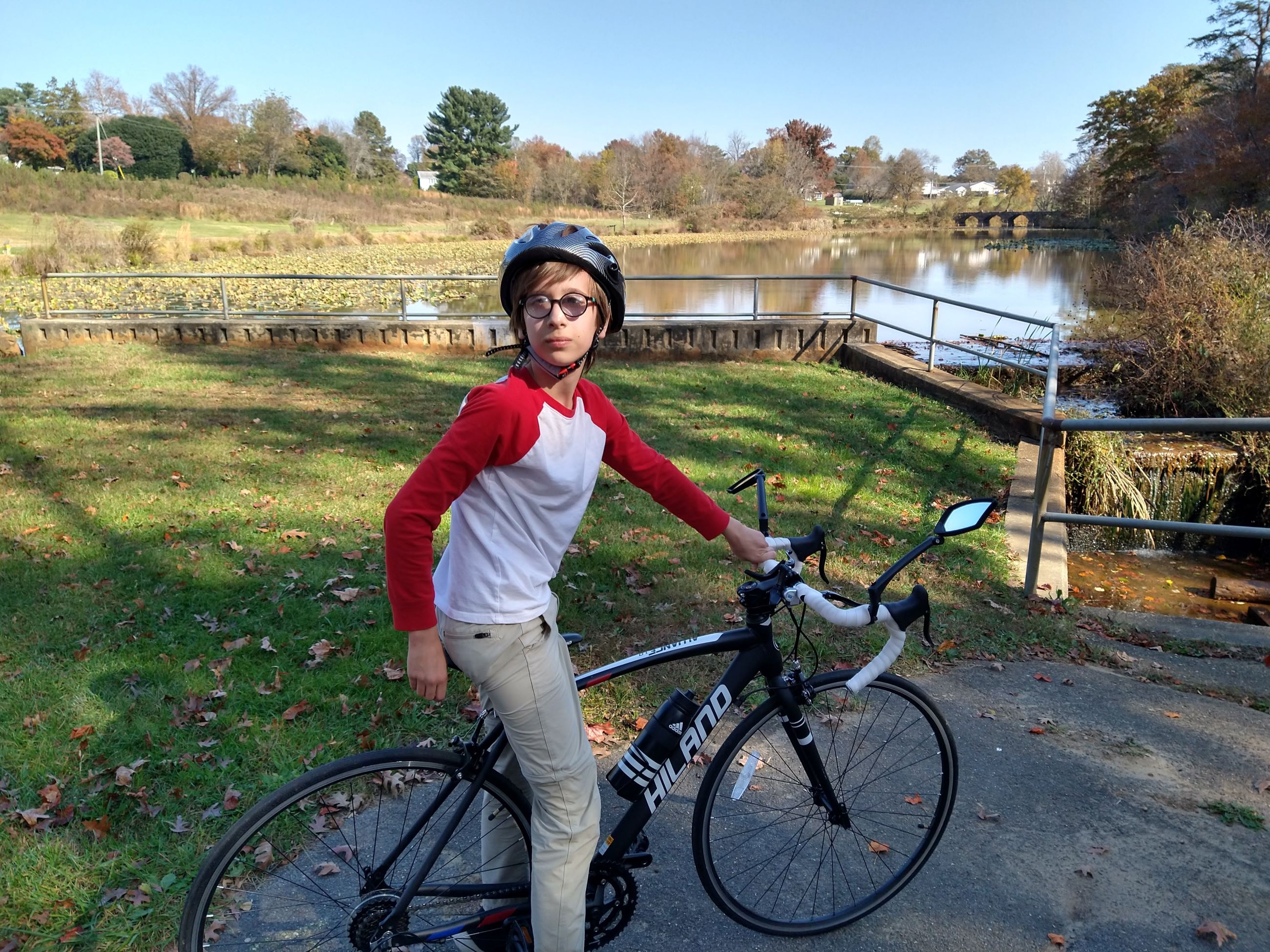 image of sam in front of a pond in bowie